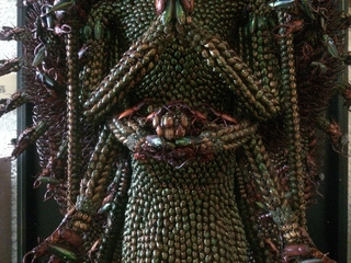 Illustration for article titled Japanese Statues Made with Dead Bugs